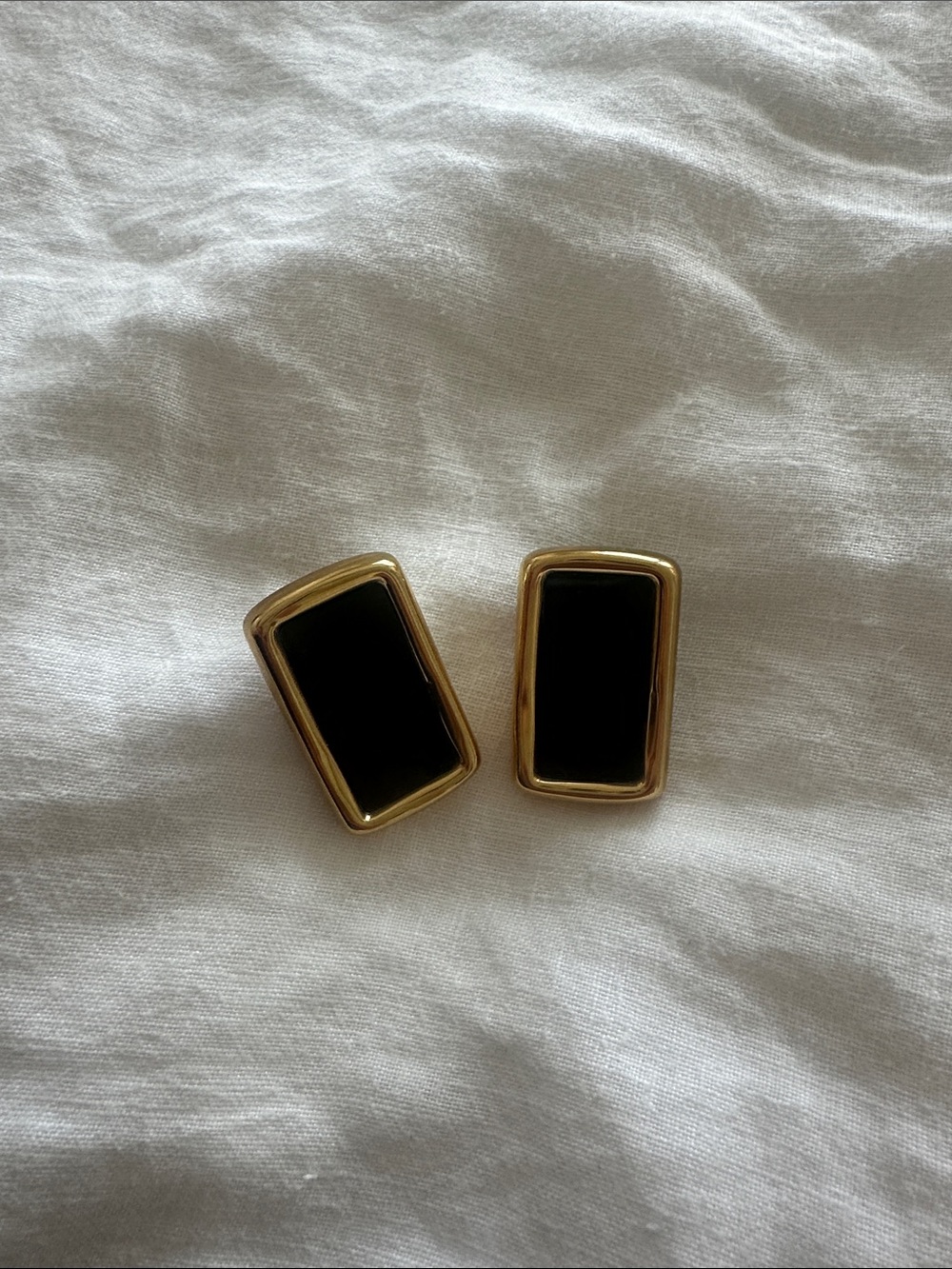 Gold and black statement earrings
